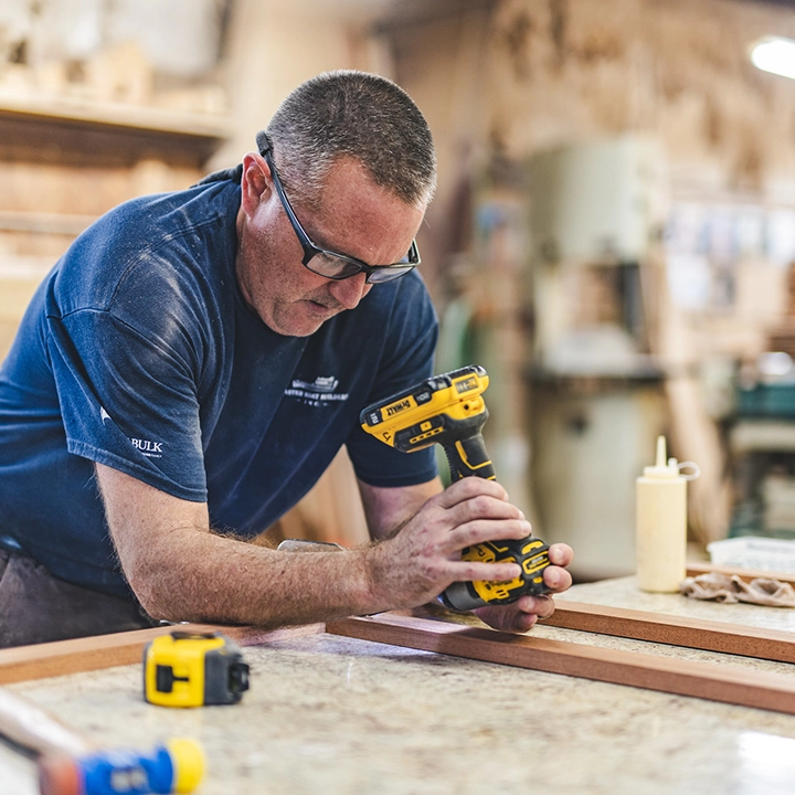 man working with drill